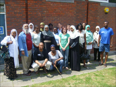 WLDT in White City (Phase 1). Koss Mohammed, WLDT manager, centre middle row between two kneeling members